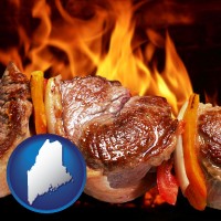 maine map icon and meat on a hot barbecue grill