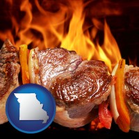 missouri map icon and meat on a hot barbecue grill