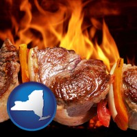 new-york map icon and meat on a hot barbecue grill
